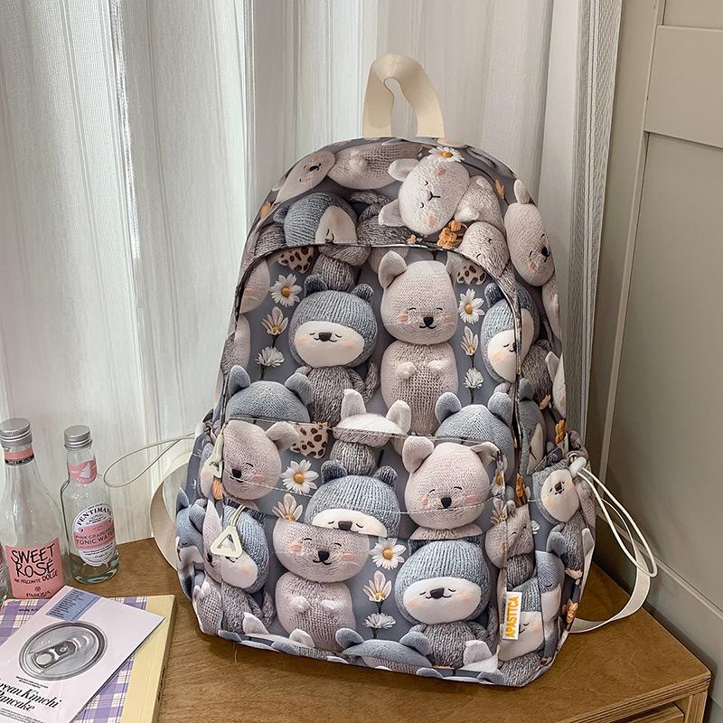 High value, fresh, sweet and cute printed backpack, lightweight make-up class for junior high school students, and large-capacity backpack.
