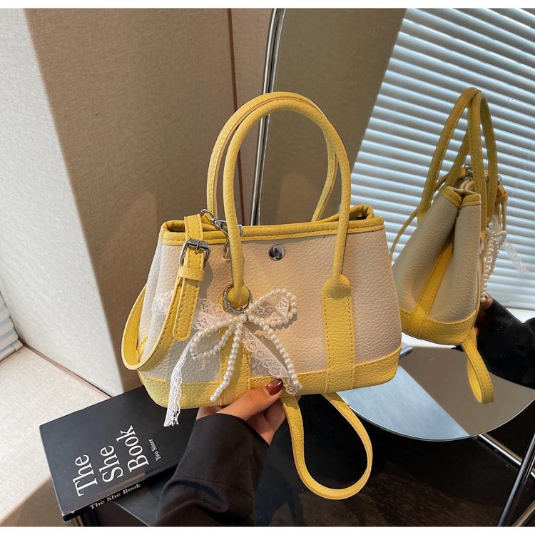 Niche design bags, new summer versatile messenger bags, popular portable bucket bags today