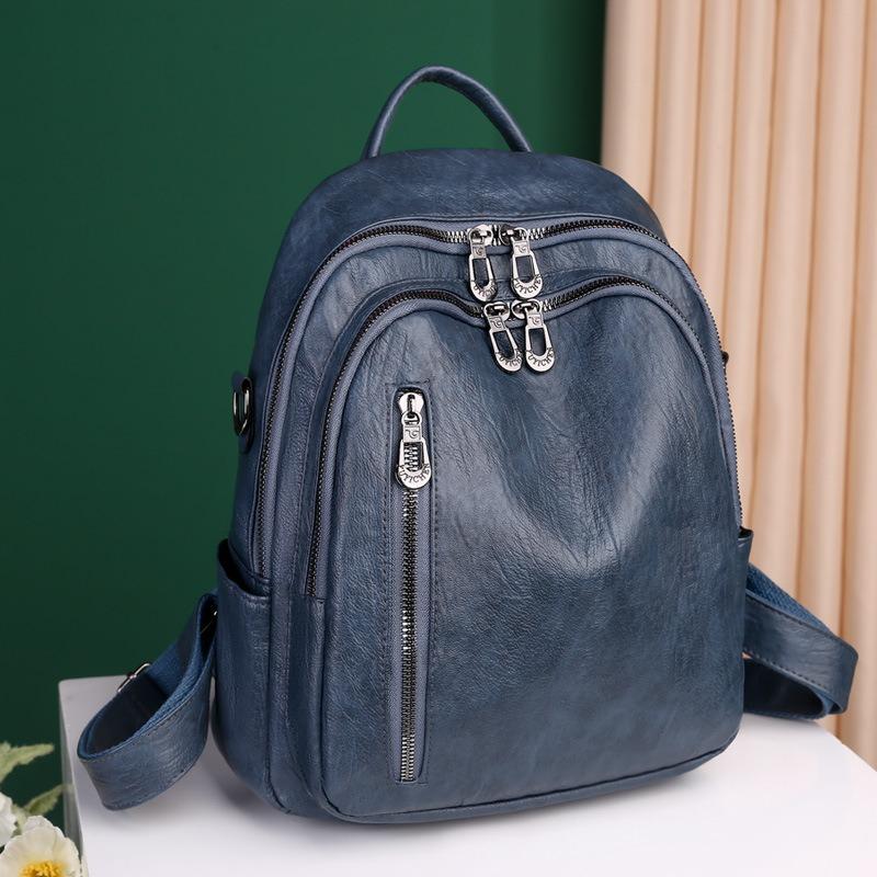 Women's bag new soft leather texture backpack fashionable solid color schoolbag flow retro large capacity travel bag