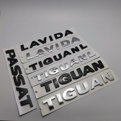 1 pièce Autocollant Badge Emblème Coffre Arrière Plastique ABS Argent et Noir pour CADDY LAVIDA TIGUAN TIGUANL Logo Décoratif