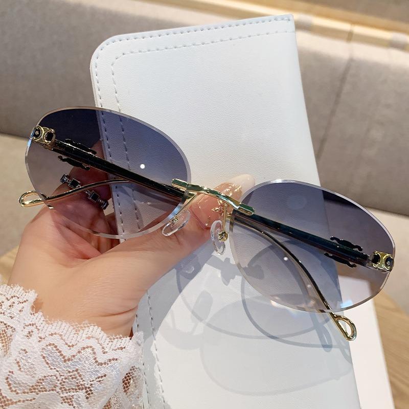 Oval Frame Metal Frameless Uv400 Sunglasses Trendy And High-End Retro Fashion Sun Protection Uv Resistant Glasses For Women
