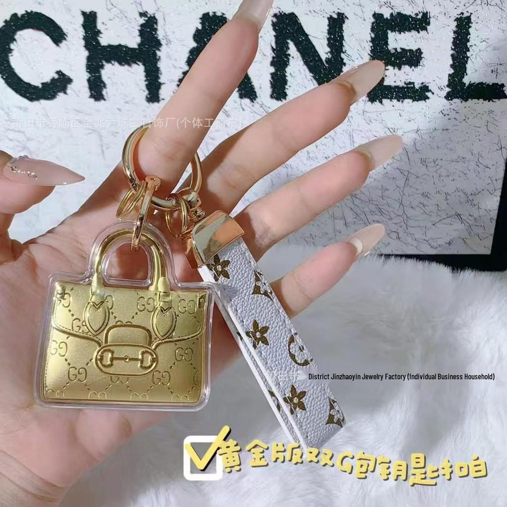 Goldene Taschenschlüsselanhänger: 20mg Reines Gold - Verspricht Reichtum, Frieden und Schönheit. Perfekt als Handy-Anhänger oder Auto-Ornament.