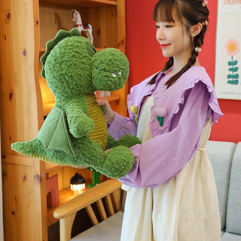 The new model transforms into a small flying dragon, green dinosaur plush toy doll, and gives children holiday gifts.