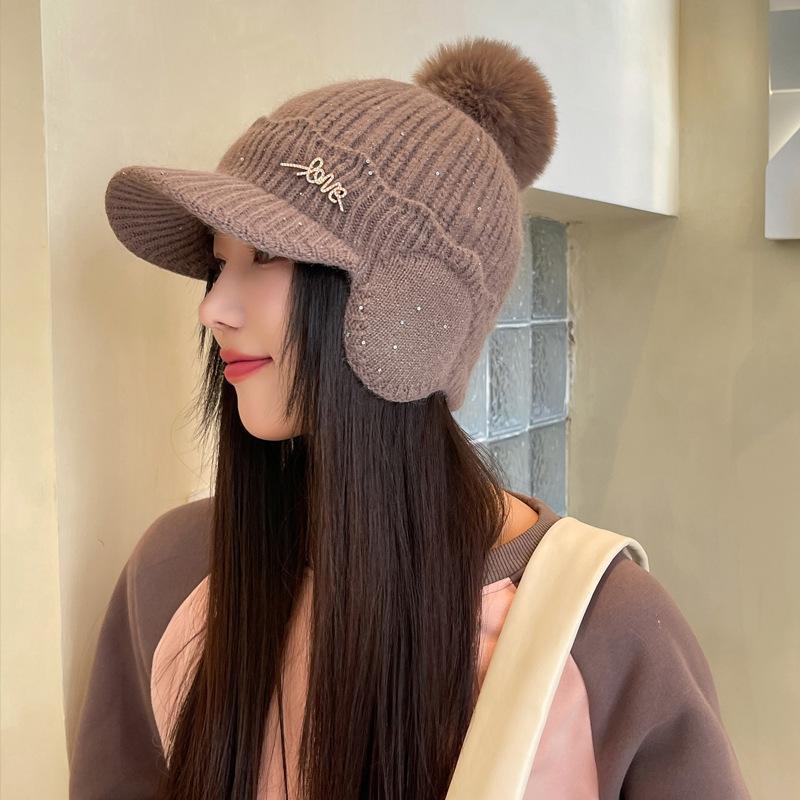 Hut Damen Herbst und Winter gestrickte Wollmütze Vielseitige verdickte kältefeste Ohrenschutzmütze Winterwarme Plüschmütze