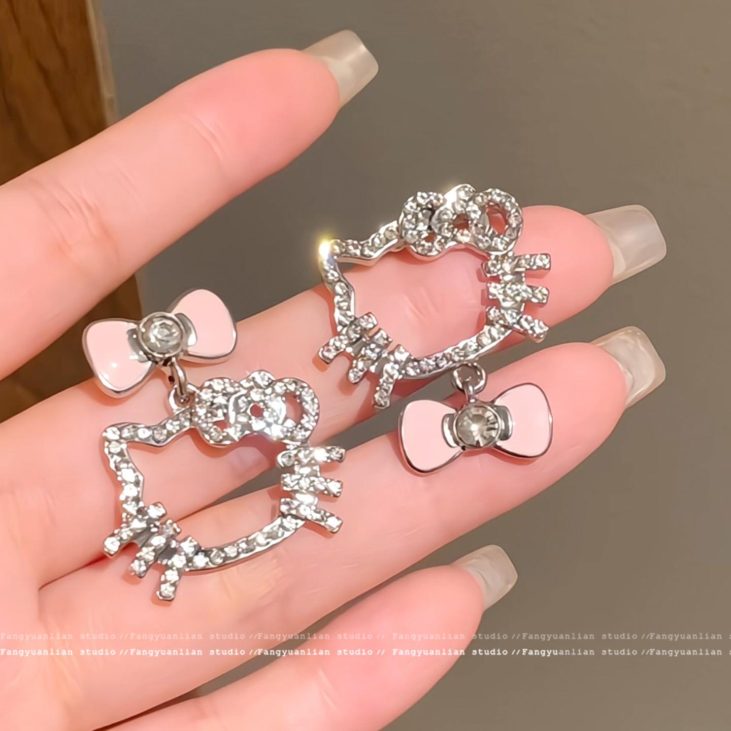 Female Super Flash Bow Kt Cat Earrings 1 pair of earrings