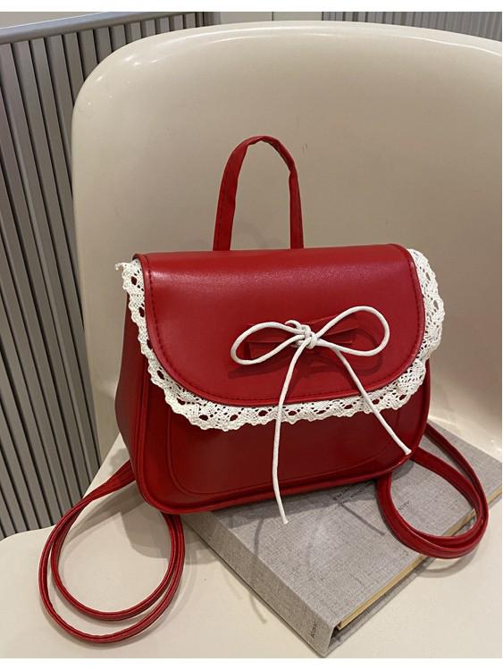 Modny damski plecak na jedno ramię z koronką i kokardą na lato 2025
