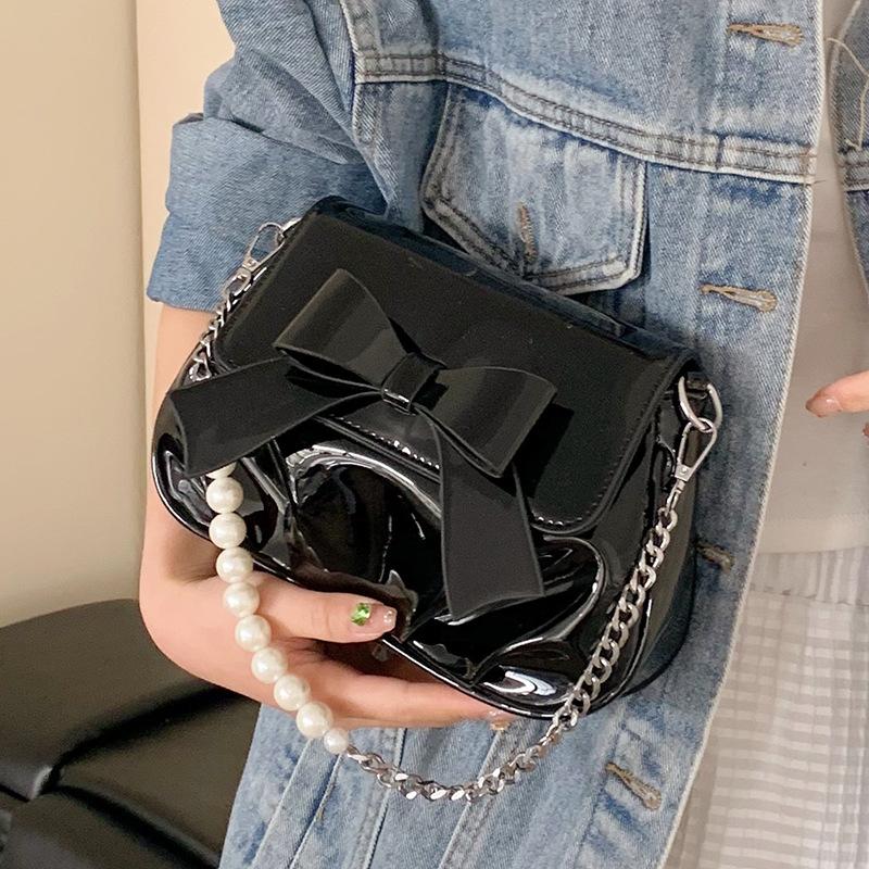 This year, French sweet style bow chain small bags are popular, fashionable and versatile, foreign style and advanced sense messenger women's bags.