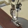 Macchina da cucire industriale Piedino a rullo Tutto acciaio inossidabile Spk-3 Con cuscinetto Piedino premistoffa per cerniera Tessuto rivestito in pelle