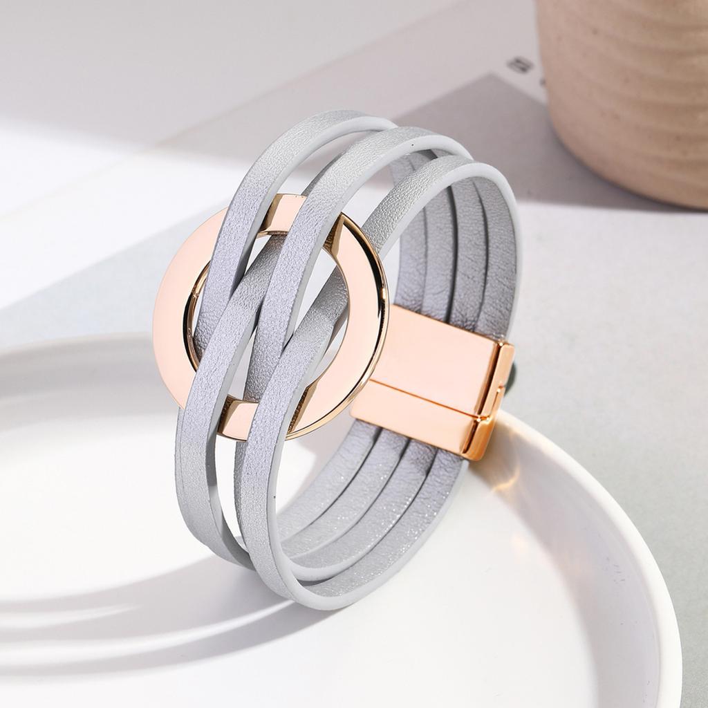 Cross-over Leder Damenarmband mit großen Metallring-Manschetten, Multi-Armband, Magnetverschluss.