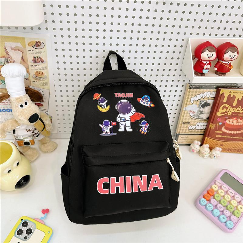 

Adorable Kids Canvas Backpack For School With Cute Cartoon Print And Letter Design