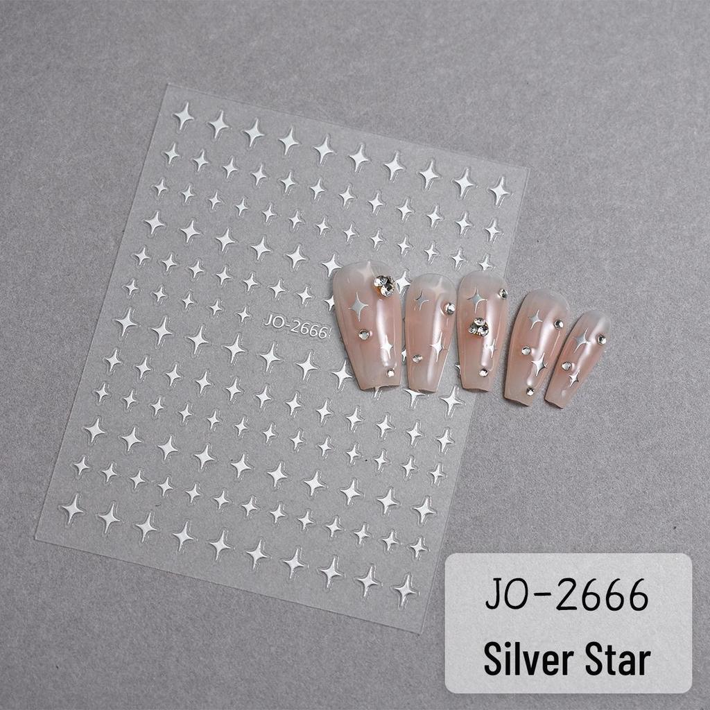 Four-Pointed Star Nail Art Stickers: Transparent Base with White, Black, and Silver Designs