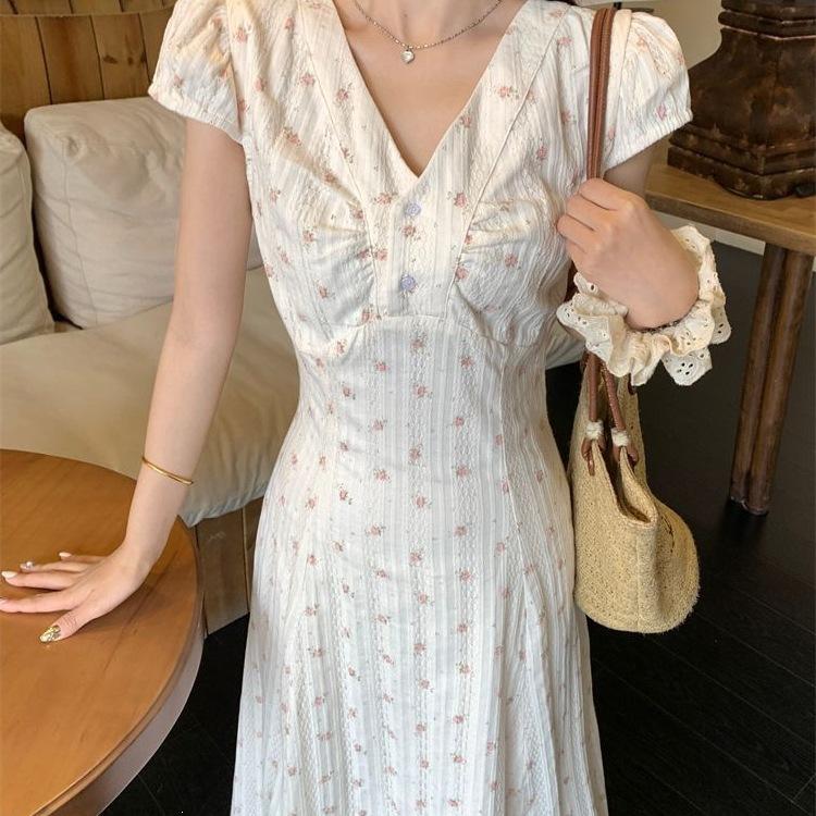 Summer academy style V-neck loose medium and long floral dress female Korean version student temperament vacation knee dress