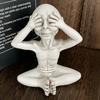 Alien figurines interior decoration. I dont want see that say it hear it. Set three.