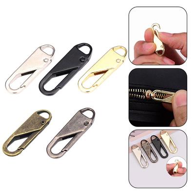 Nástroj pro jezdce zipu bez použití nářadí 3,7*1,1*0,5 cm