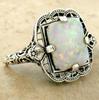 Three Heroes Elegant Artificial Opal Ladies' Ring with Carved Alloy Inlay