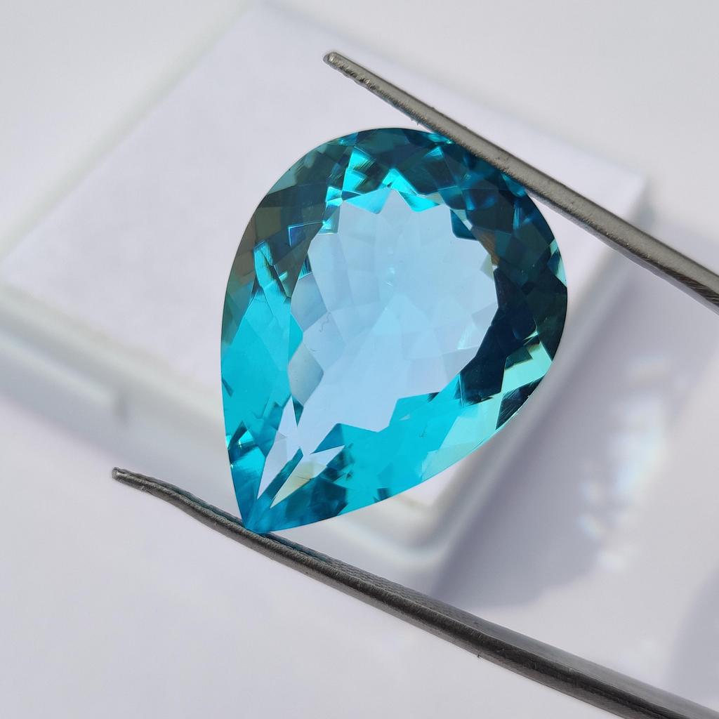 Pear Cut Sky Blue Topaz Shade Glass Stone, 21.95 Carat, 24x18x10 MM Size Pear Shape Stone.