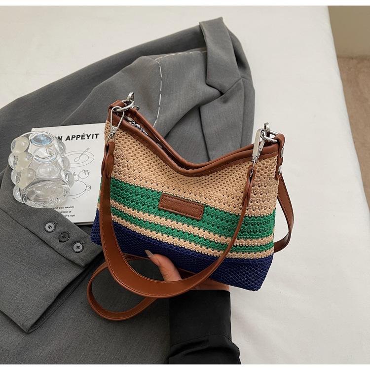 

Woven striped portable large bag women s 2025 new large-capacity leisure tote bag leisure vacation wind messenger bag