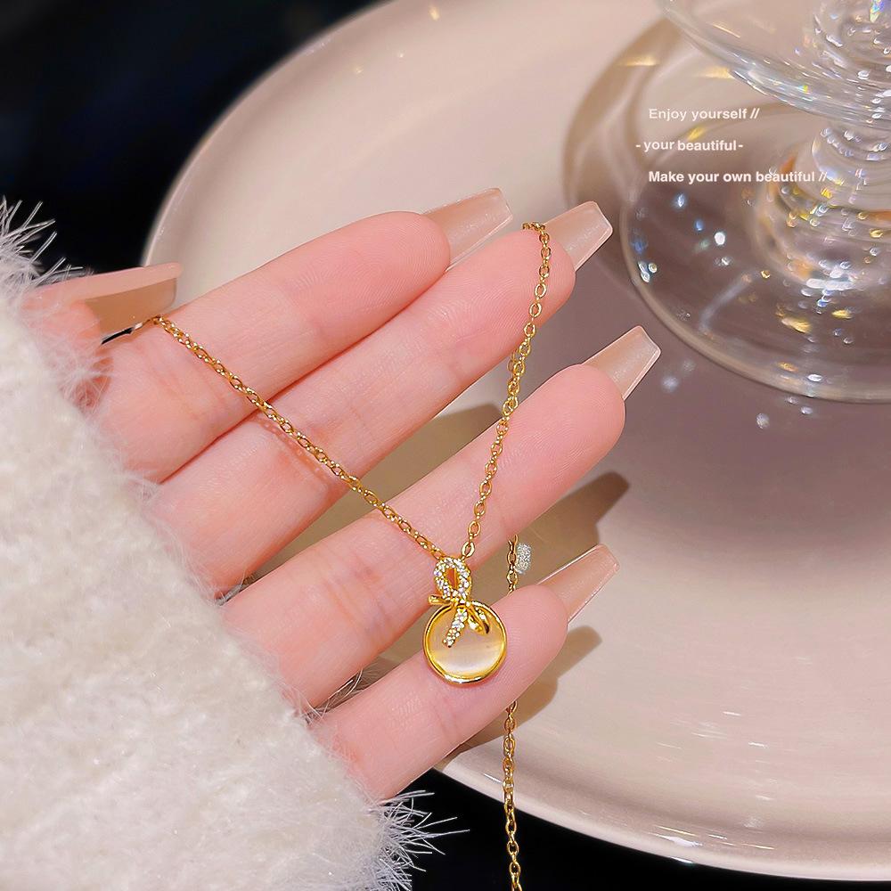 Online celebrity bow necklace titanium steel simple personality design sense Opal clavicle chain hot accessories.