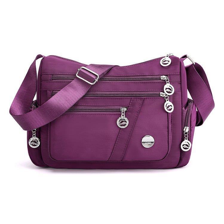 Damska wodoodporna nylonowa torba crossbody Duża pojemność Wielokieszeniowa torba na ramię Lekka podróżna torba-listonoszka Codzienna portmonetka