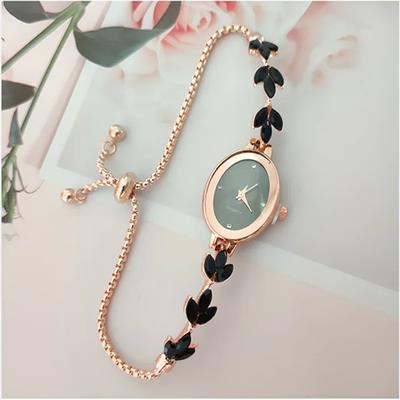 Montre élégante pour femme, bracelet à quartz ovale avec strass incrustés, style trèfle