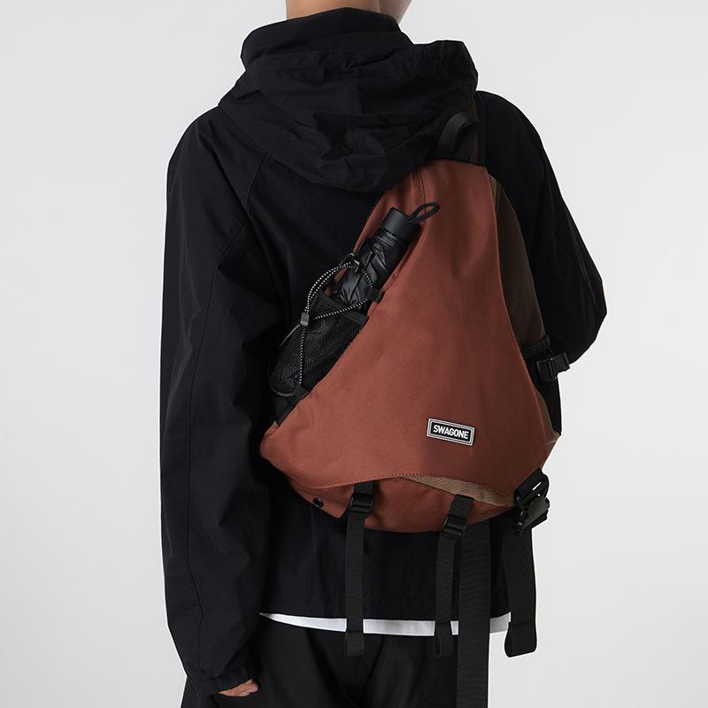 Fashion trendy cool outdoor mountaineering travel men and women with the same backpack contrasting colors large capacity shoulder messenger bag