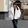 The new imitation fox fur coat is thin, fashionable medium and long, fluffy young environmentally friendly leather plush coat for women