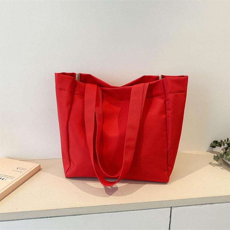 Bag women's new solid color large-capacity canvas shoulder bag simple commuter student tote bag shopping bag tide