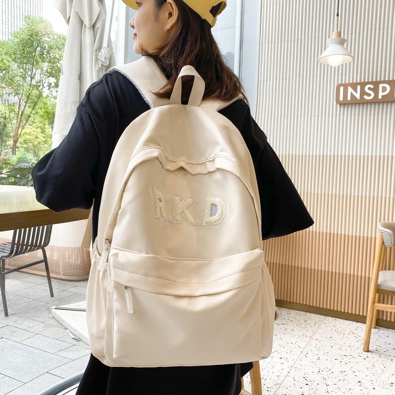 Simple and fashionable nylon backpack, new Korean version of large-capacity junior high school student schoolbag Mori backpack female
