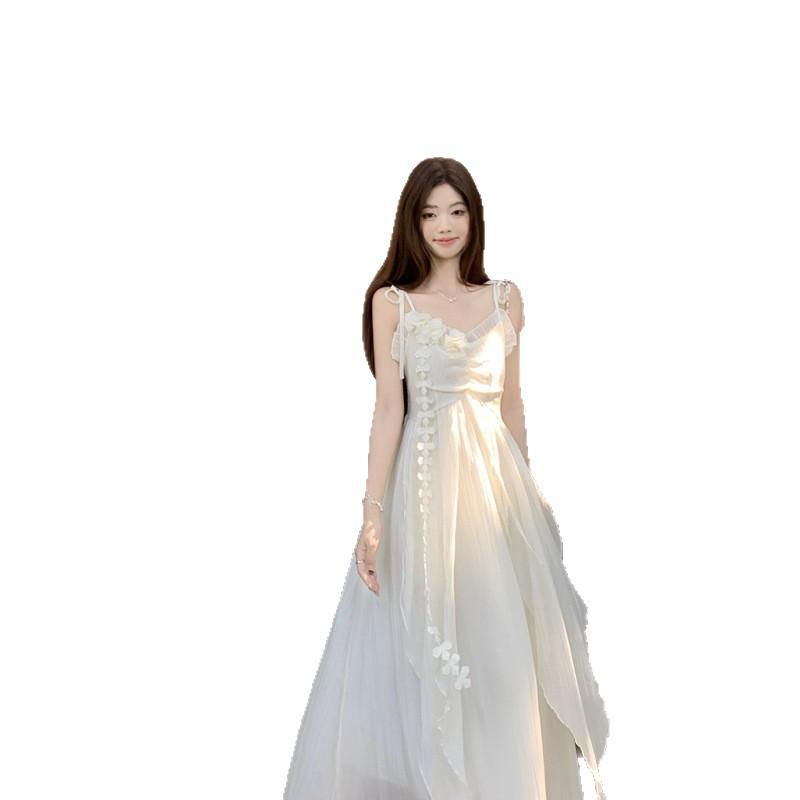 Holiday style flower design suspender dress women's 2026 summer new waist thin very fairy long skirt