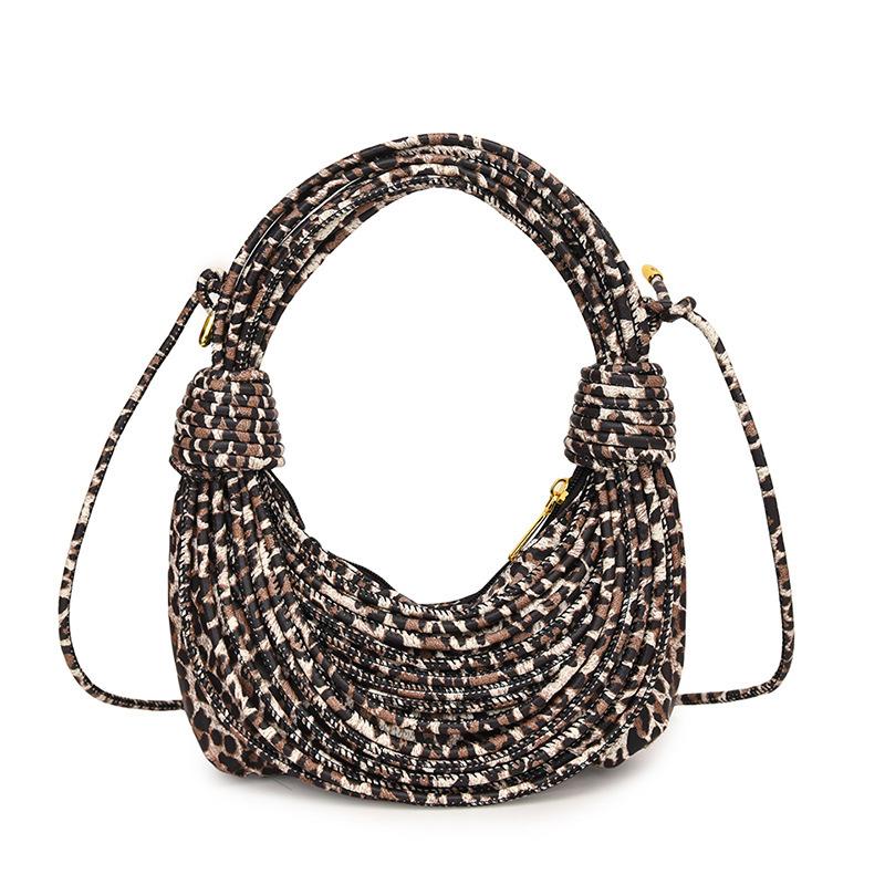 Personalized leopard print bag women's 2025 new European and American fashion niche versatile women's one-shoulder hand-carried noodle woven bag