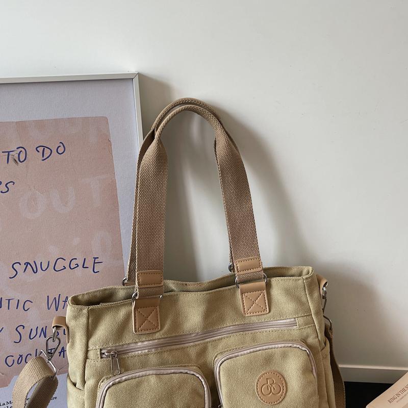 Stylish Canvas Shoulder Bag for Women, Multi-Pocket Tote with Adjustable Strap and Durable Design