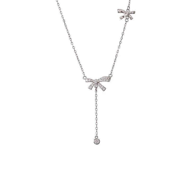 Elegant S925 Sterling Silver Bow Tassel Necklace: Luxury Clavicle Chain for Women with a Chic, Sophisticated Touch.