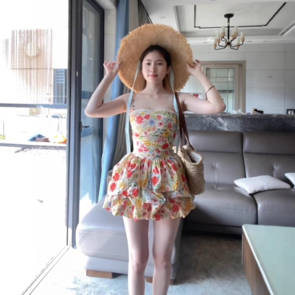 Seaside vacation floral suspender dress women's spring and summer pure desire beautiful temperament waist slim fluffy short skirt