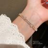 Leichte Luxus-Kupfer-Handkette mit Blüten-Design für modische Damen-Accessoires