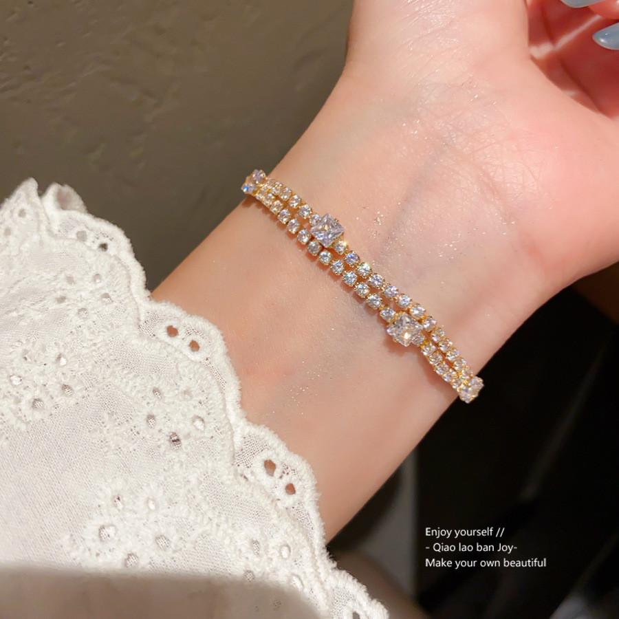 Leichte Luxus-Kupfer-Handkette mit Blüten-Design für modische Damen-Accessoires