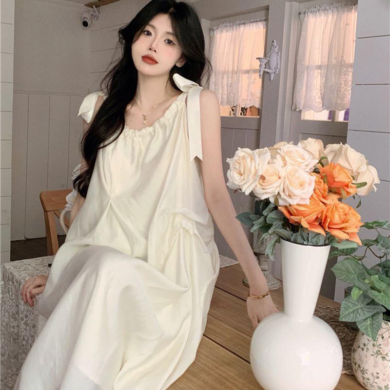 Xiaoxiangfeng French suspender chiffon dress women's summer new temperament seaside beach vacation medium and long dress