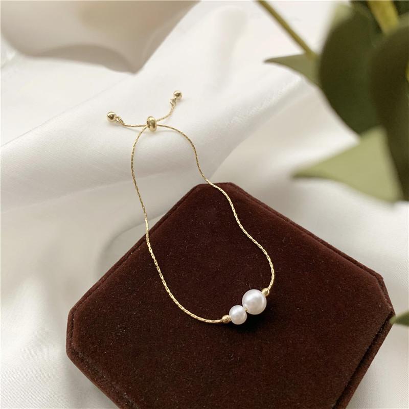 DIEYURO 316L Stainless Steel Golden Elegant Faux Pearl Accents Chic Pullable Bracelet Lady Classic Non-fading Hand Chain Jewelry