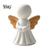 Modern Interior Design Accents Minimalist Angel Figurine with Wood Texture Wings, Compact Statue, Halloween Decorative Ornaments White Sculpture