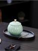 Celadon Ceramic Tea Canister: Large Half-Pound Capacity Storage for Green or Black Tea - Porcelain Sealing Jar with Printed Design.