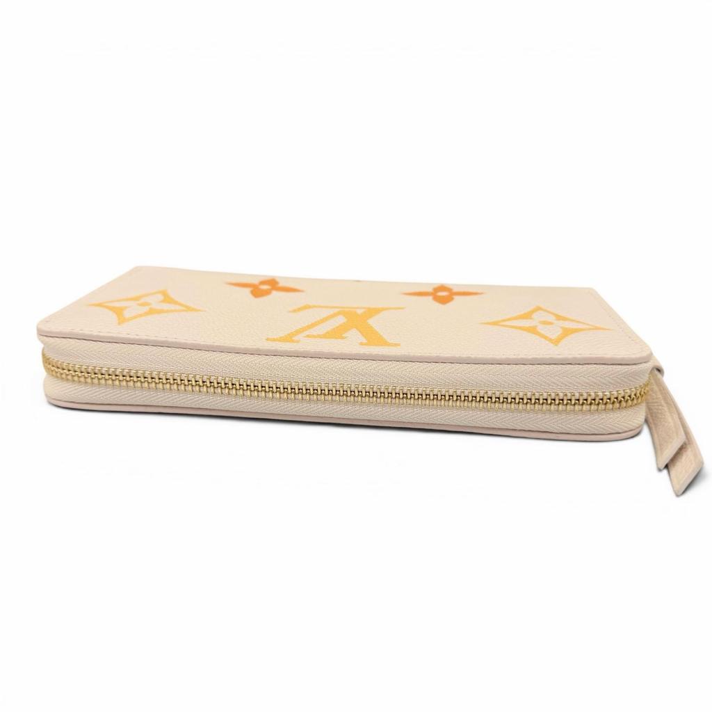 Pristine LOUIS VUITTON LV Gradient Empreinte Zip Around Zippy Wallet M82206 Used