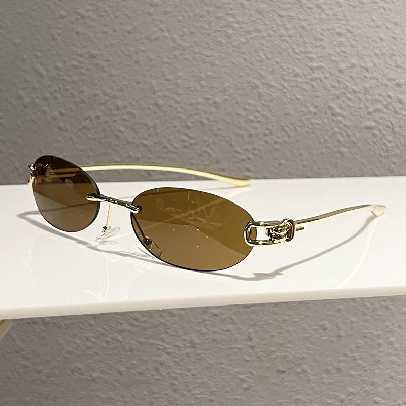 New elliptical frameless metal temple YK knot women's sunglasses personalized street shot Internet celebrity sunglasses
