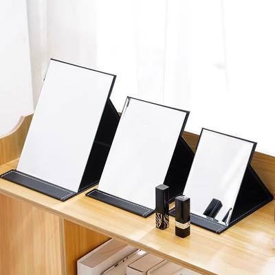 Espejo de maquillaje Espejo de escritorio plegable Espejo de cuero portátil Espejo de tocador de escritorio grande y pequeño para dormitorio de estudiantes Espejo de tocador de escritorio HD para mujeres