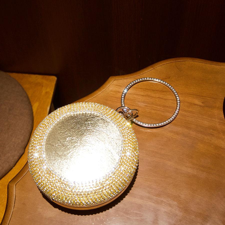 Luxury clutch bag, shiny rhinestone ring handbag, exquisite diamond-encrusted fashionable round bag.