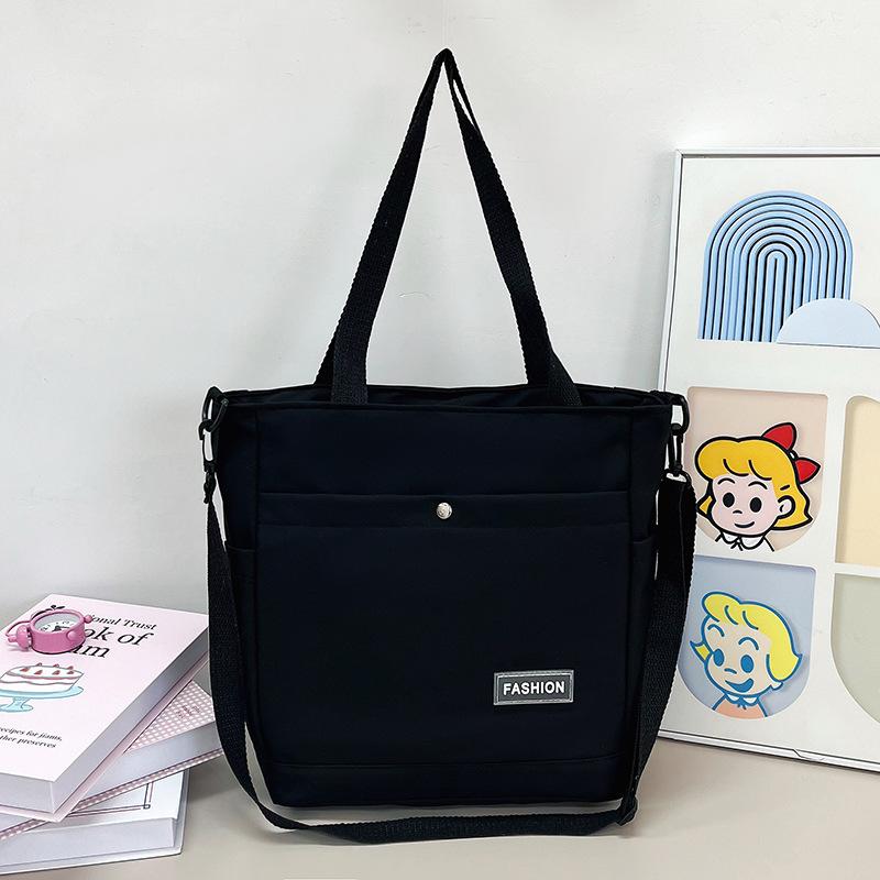 

Solid color nylon shoulder bag casual versatile large capacity portable tote bag student outdoor travel messenger bag One Size