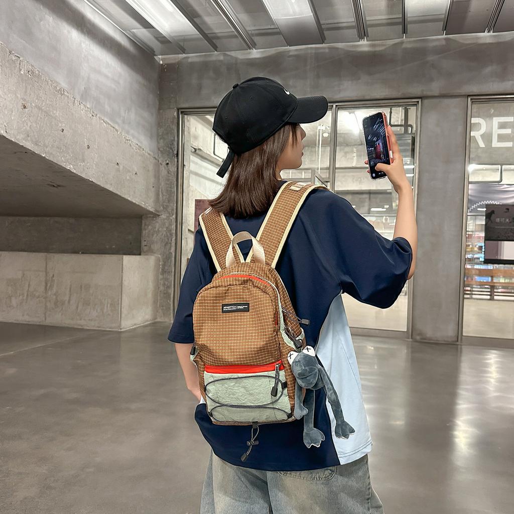 Schoolbag1011 new high-value contrasting color splicing backpack bag, male and female students schoolbag, outdoor travel backpack, large capacity