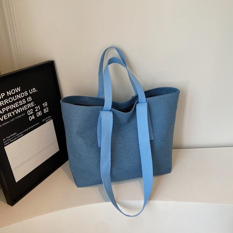 2025 summer new fashion simple solid color portable tote bag lazy wind commuting large capacity shoulder canvas bag