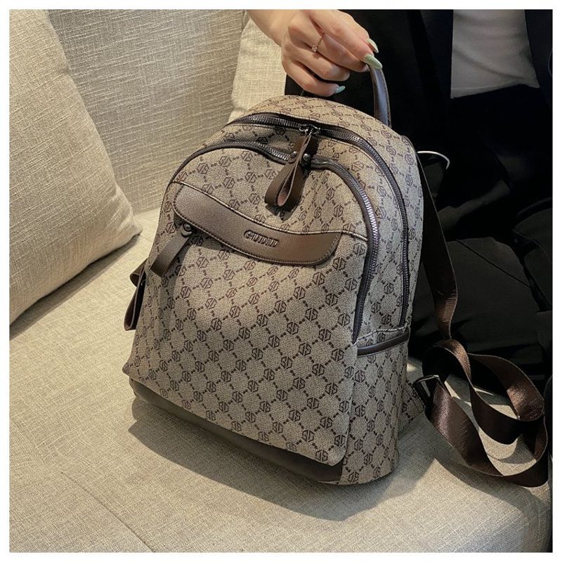 

Оригинальные товары Универсальная сумка из натуральной кожи Женская 2025 Лето Новое поступление Большая вместимость Школьный рюкзак Рюкзак Дорожная сумка Повседневный рюкзак Khaki trumpet