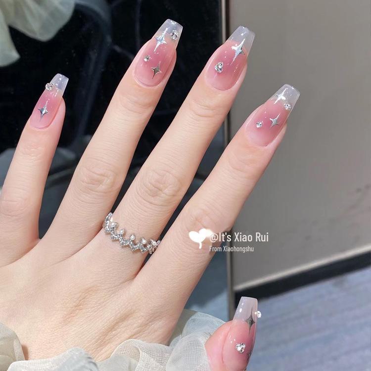 Four-Pointed Star Nail Art Stickers: Transparent Base with White, Black, and Silver Designs