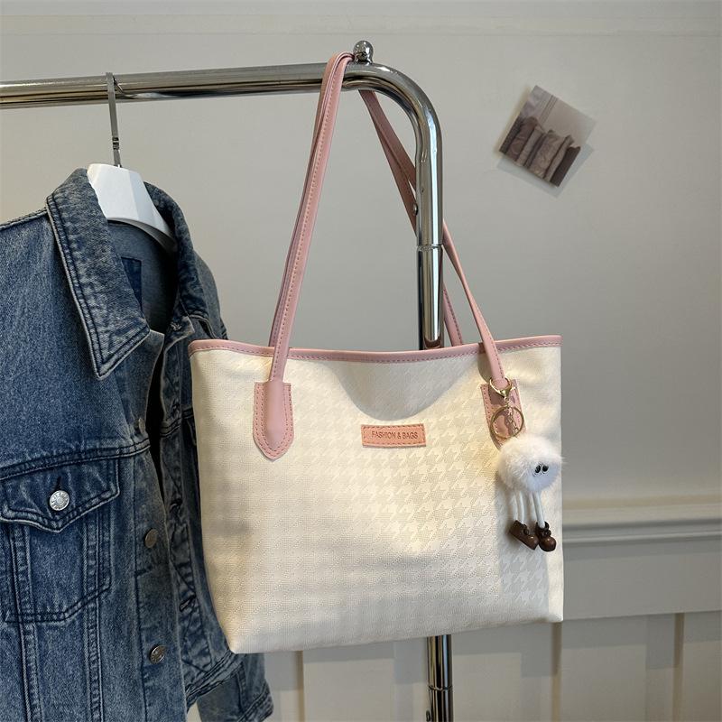 

Wholesale tote bag women s large-capacity commuter bag spring and summer versatile shoulder bag fashion college student new women s bag single pack рожевий