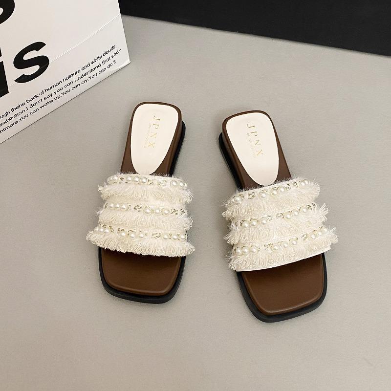 

Slippers women wear summer and summer new versatile cute one-word flat-bottomed seaside cool slippers 36